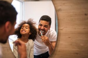 happy brushing teeth